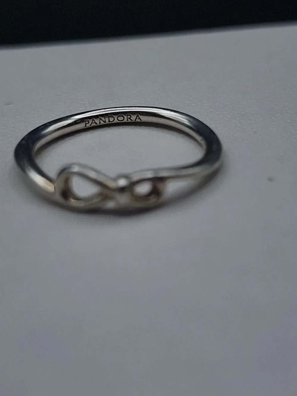 Pandora infinity knot